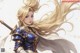 A woman with long blonde hair holding a sword.